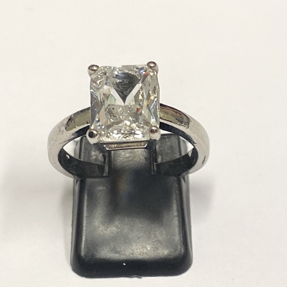 Engagement ring with large stone, silver toned